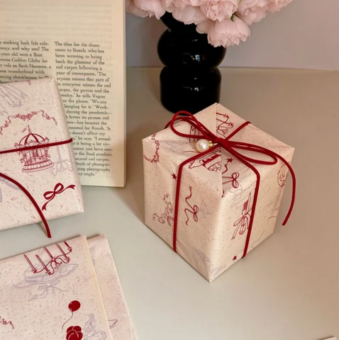 Carousel-print wrapping paper, packaging detail