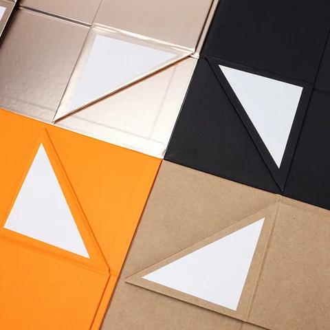 Triangular-handle folding boxes, packaging detail
